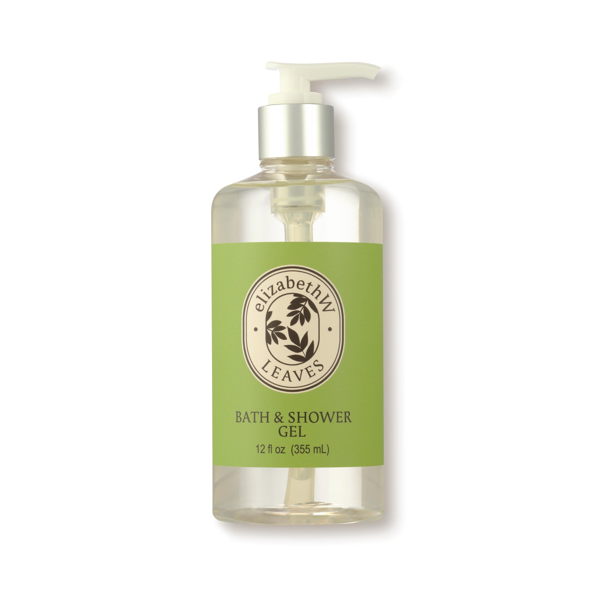 Clear plastic bottle of elizabethW Leaves Bath & Shower Gel with pump, 12 fl oz (355 mL). The wrap-around label features the fragrance name inside an oval with an icon in the center.