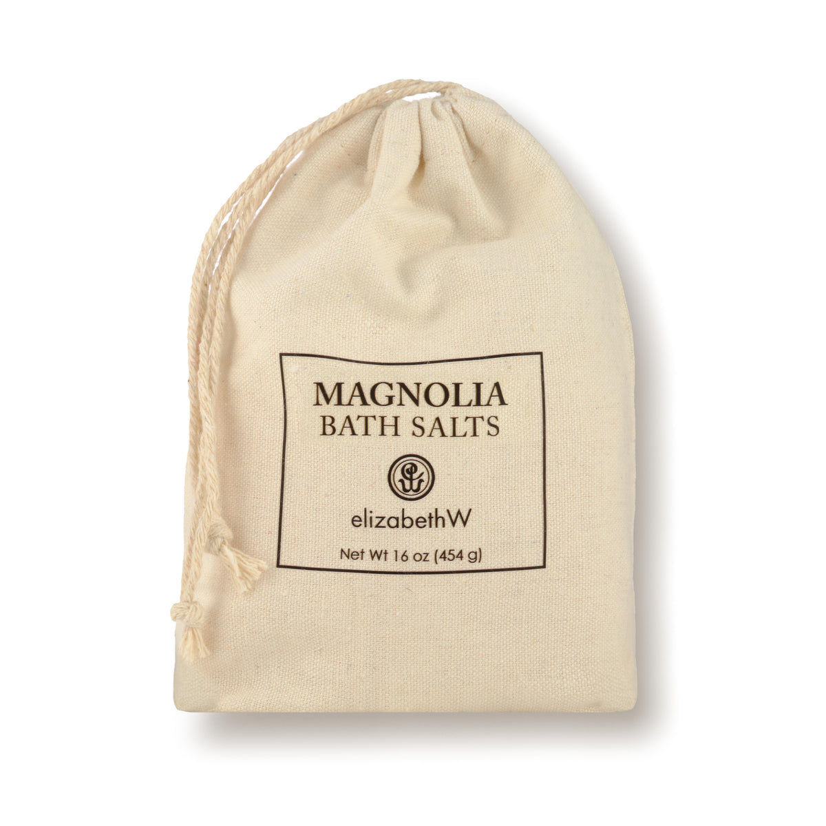 A drawstring cloth bag containing Magnolia bath salts. The label on the front reads &quot;Magnolia Bath Salts&quot; with the elizabethW logo and &quot;san francisco.&quot; The bag contains 16 oz (454 g) of product.