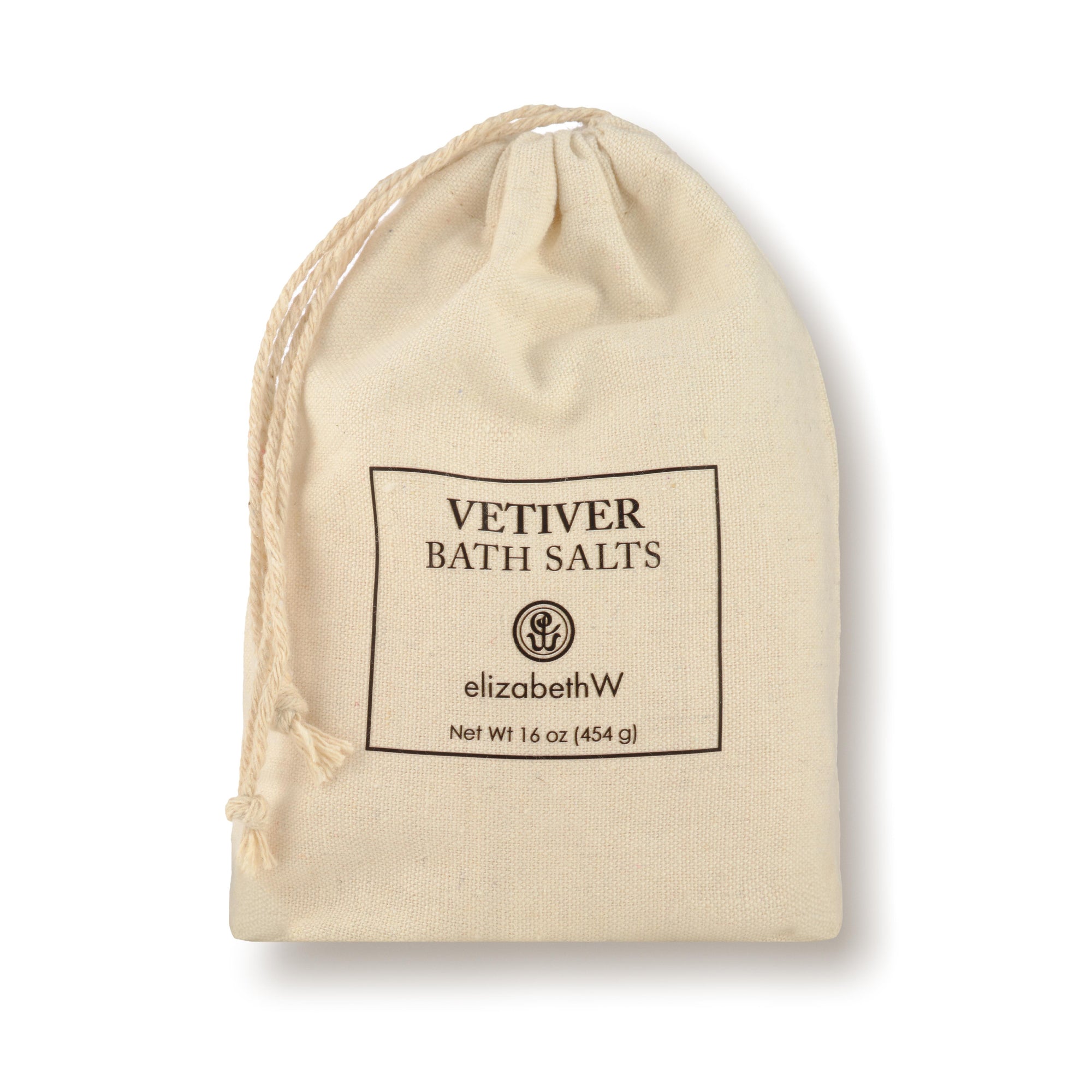 A drawstring cloth bag containing Vetiver bath salts. The label on the front reads "Vetiver Bath Salts" with the elizabethW logo and "san francisco." The bag contains 16 oz (454 g) of product.